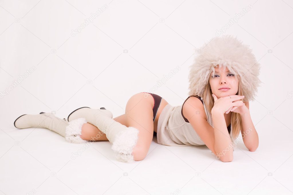 Laying sexy woman in furry hat