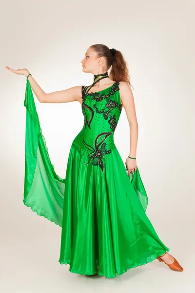 Professional dancer in long green dress — Stock Photo, Image
