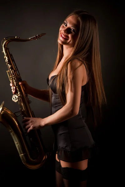 Smiling girl with sax — Stock Photo, Image