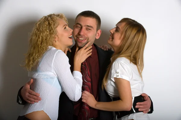 Obchodní muž s dvěma dívkami — Stock fotografie