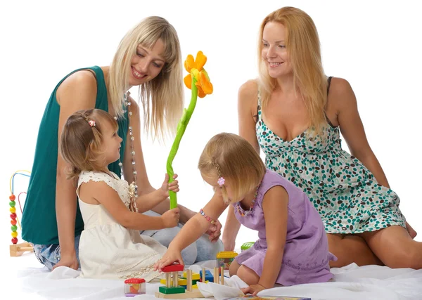 Матери с дочерьми, играть — стоковое фото