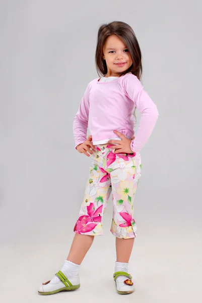 宝贝女儿穿着颜色鲜艳的衣服 — 图库照片