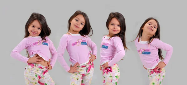 Meisje van de baby in felgekleurde kleding — Stockfoto