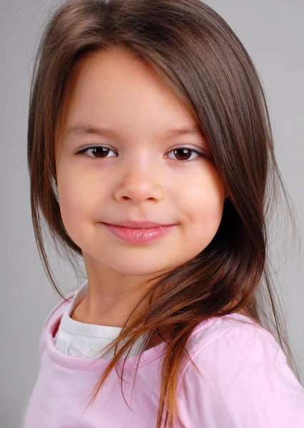 Baby girl with brown hair — Stock Photo, Image
