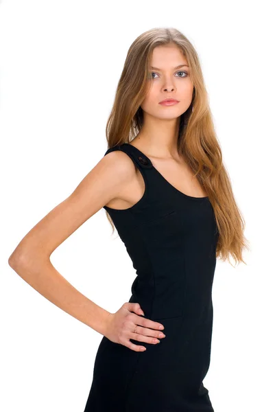 Стройная девушка в черном платье — стоковое фото