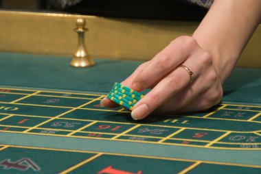 Casino dealer handling gambling chips clipart