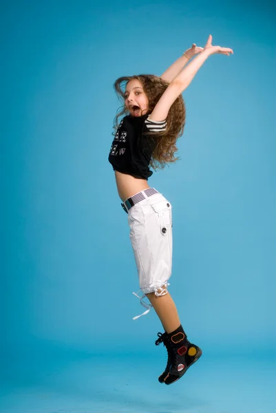 Young girl jumping of joy — Stock Photo, Image