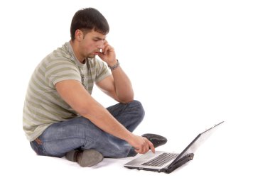 Young man working with laptop clipart