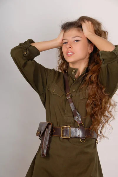 Beautiful long-haired girl in military s — Stock Photo, Image