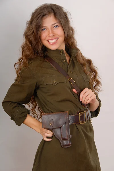 Beautiful long-haired girl in military s — Stock Photo, Image