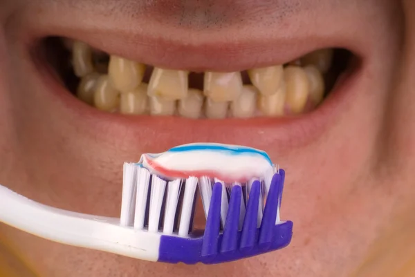 Osoba szczotkowanie zębów — Zdjęcie stockowe