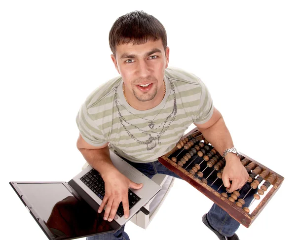 Modern kille med laptop och countin — Stockfoto