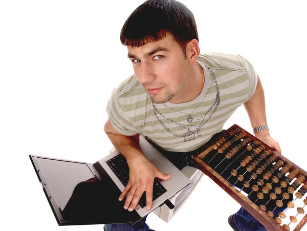 Cara contemporâneo com laptop e contador — Fotografia de Stock