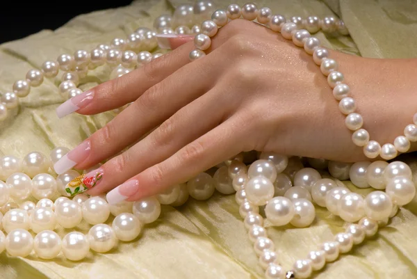 Hand in the pearl — Stock Photo, Image