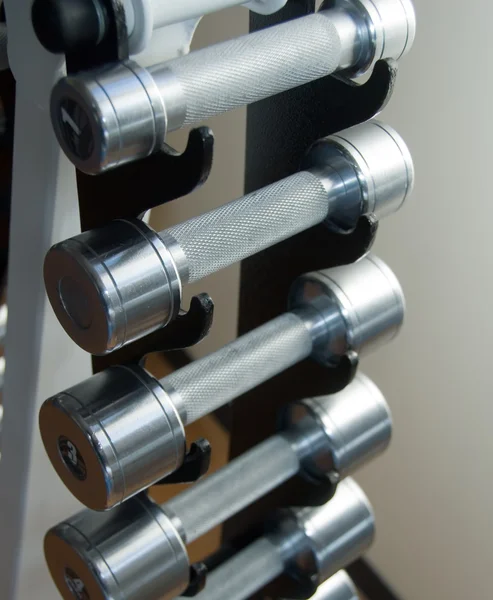 stock image A set of dumbbells of different weight