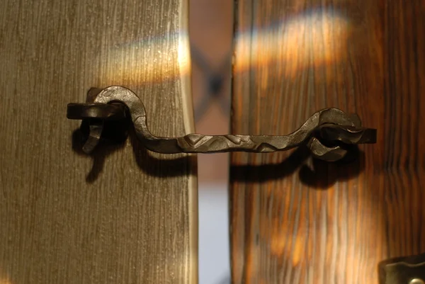 stock image Metallic hook on a vintage wooden door