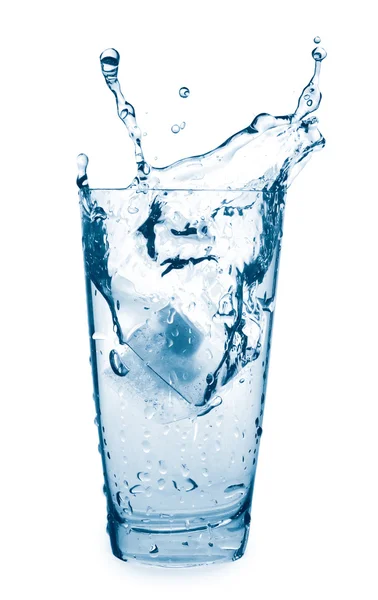 Postříkání vodou ve sklenici — Stock fotografie