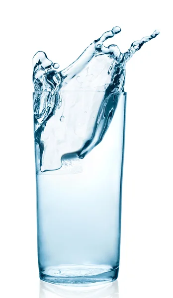 Water spat in een glas — Stockfoto