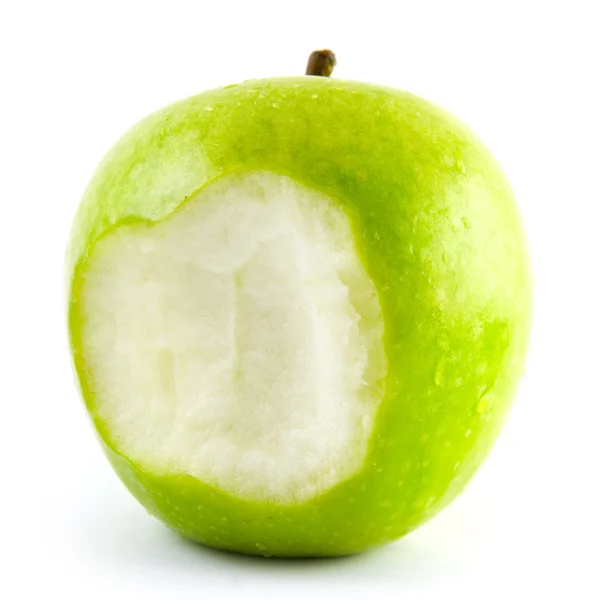 Bitten off green apple — Stock Photo, Image