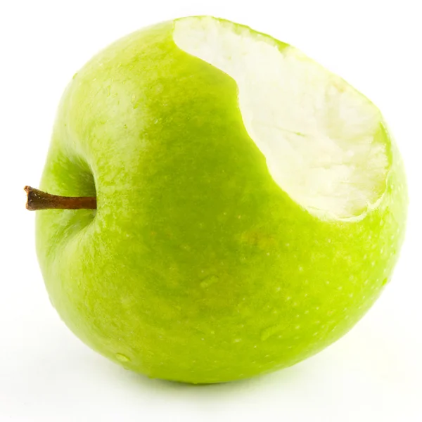 Bitten off green apple — Stock Photo, Image