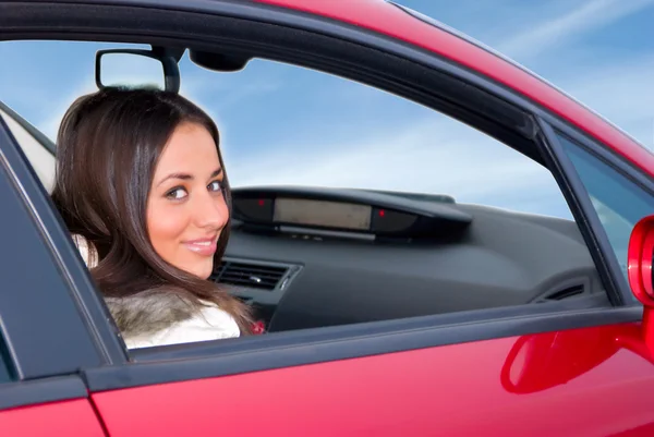 Vrouw in een auto — Stockfoto