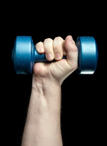 Dumbbell in a hand — Stockfoto