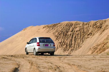 The car in sand clipart