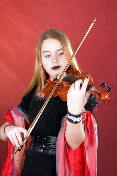 Den gotiska violinisten. — Stockfoto