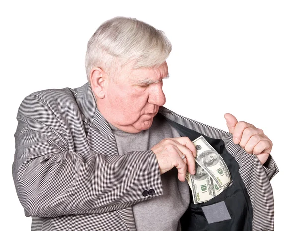 Äldre man lägger pengar — Stockfoto