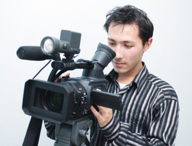 Cameraman with a camera clipart