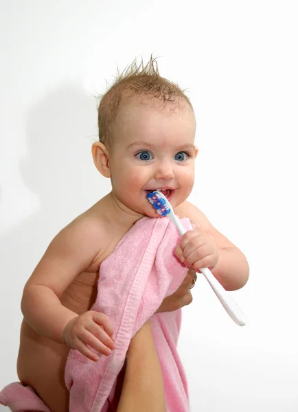 El niño con un cepillo de dientes —  Fotos de Stock