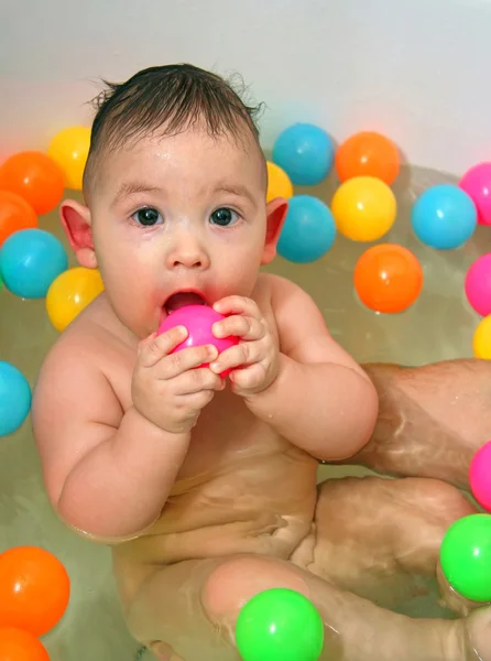 The child bathing in a bath — Stock Photo, Image