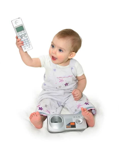 El niño pequeño con teléfono —  Fotos de Stock