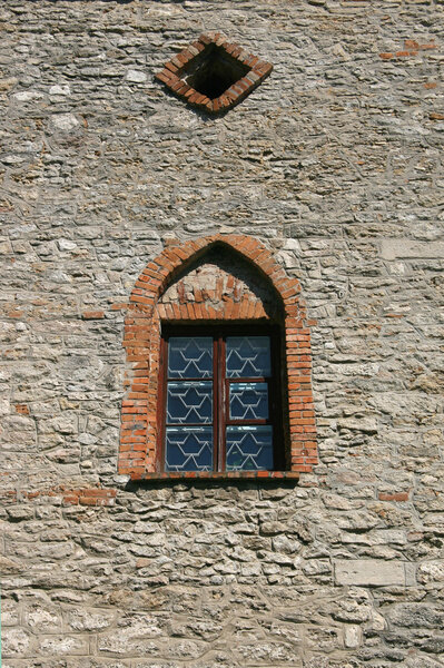Window in a wall of an old fortress