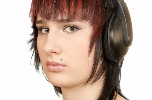 Frau mit Kopfhörern lizenzfreie Stockbilder