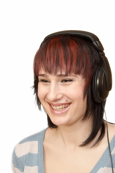 Frau mit Kopfhörern Stockfoto
