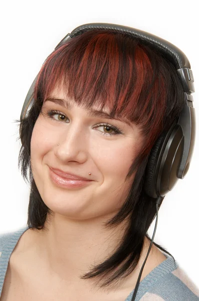 Frau mit Kopfhörern lizenzfreie Stockfotos