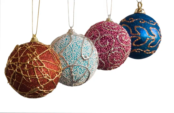 Quatro bolas de Natal de artesanato — Fotografia de Stock