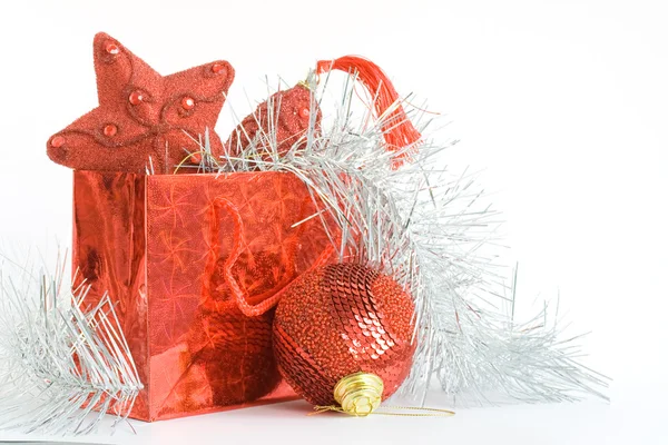 Red bag with christmas toys — Stock Photo, Image
