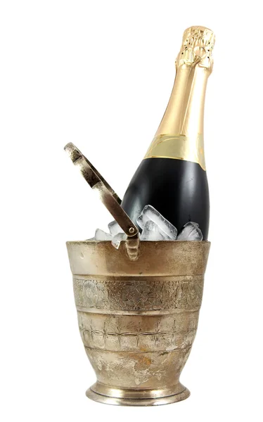 A bottle of champagne in an old silver i — Stock Photo, Image