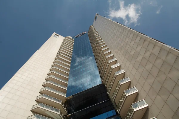 stock image Modern office center under blue sky