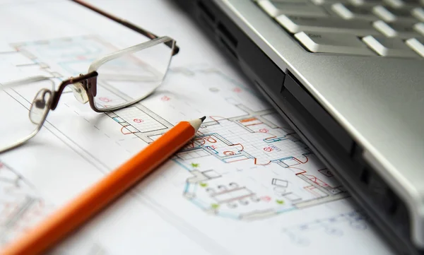 stock image Laptop, pencil and glasses on home draft