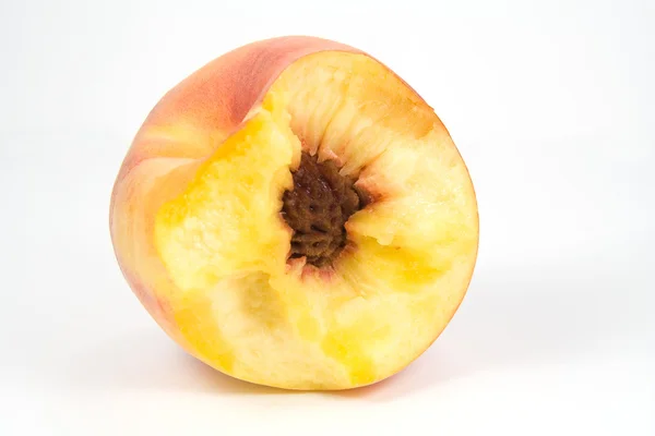 Bitten juicy peach — Stock Photo, Image