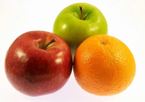 Pommes orange, rouge et verte — Photo