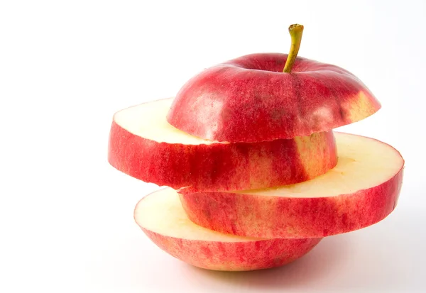 Red apple in slices — Stock Photo, Image