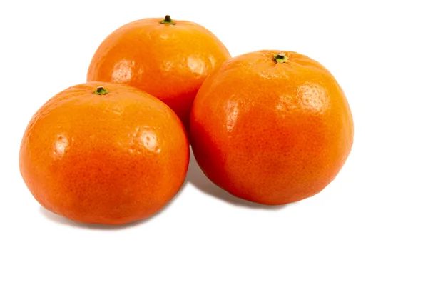 Three mandarines with shadows — Stock Photo, Image