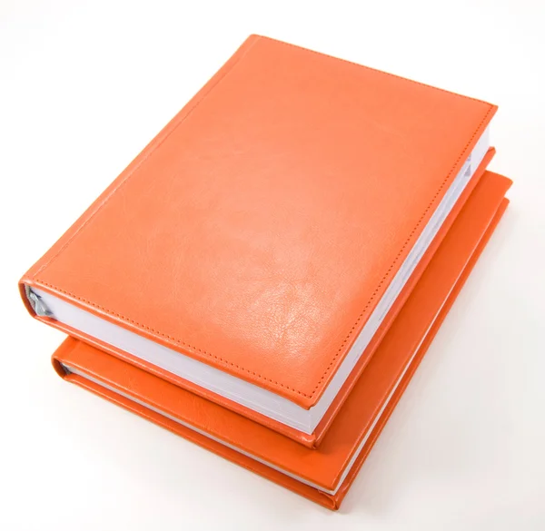 Two orange diaries on white — Stock Photo, Image