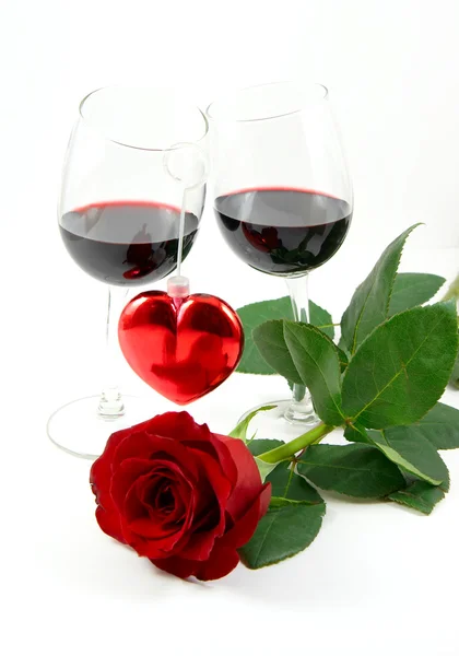 stock image Two wineglasses, heart and rose