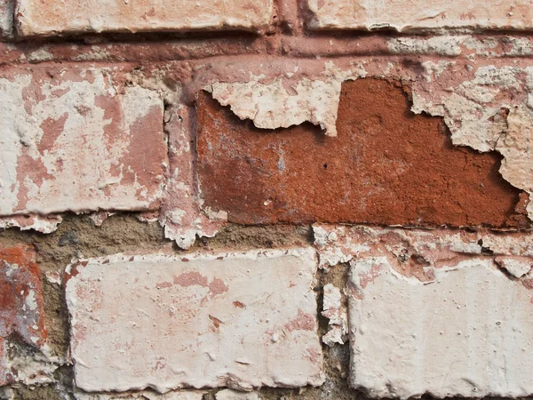 Close-up beeld van verweerde geschilderde baksteen — Stockfoto