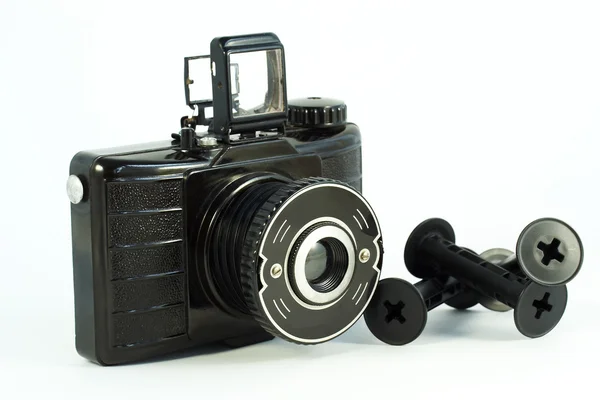 Vintage film camera with empty rolls — Stock Photo, Image